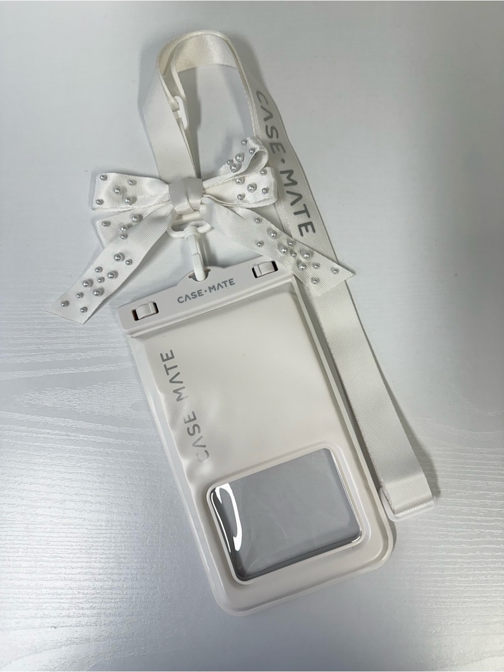 case-mate White Ivory Waterproof Floating Phone Pouch with Bow